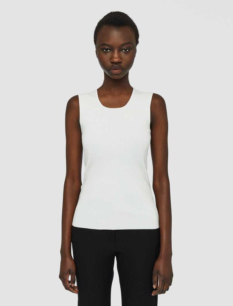 Part of the permanent Joseph Foundations Collection, the Silk Stretch Tank top is a must have for your wardrobe.&nbsp; Crafted from a super soft blend of silk and lycra this piece offers comfort and shape and is finished with a flattering round neckline.&nbsp; You'll want this in black and ivory!