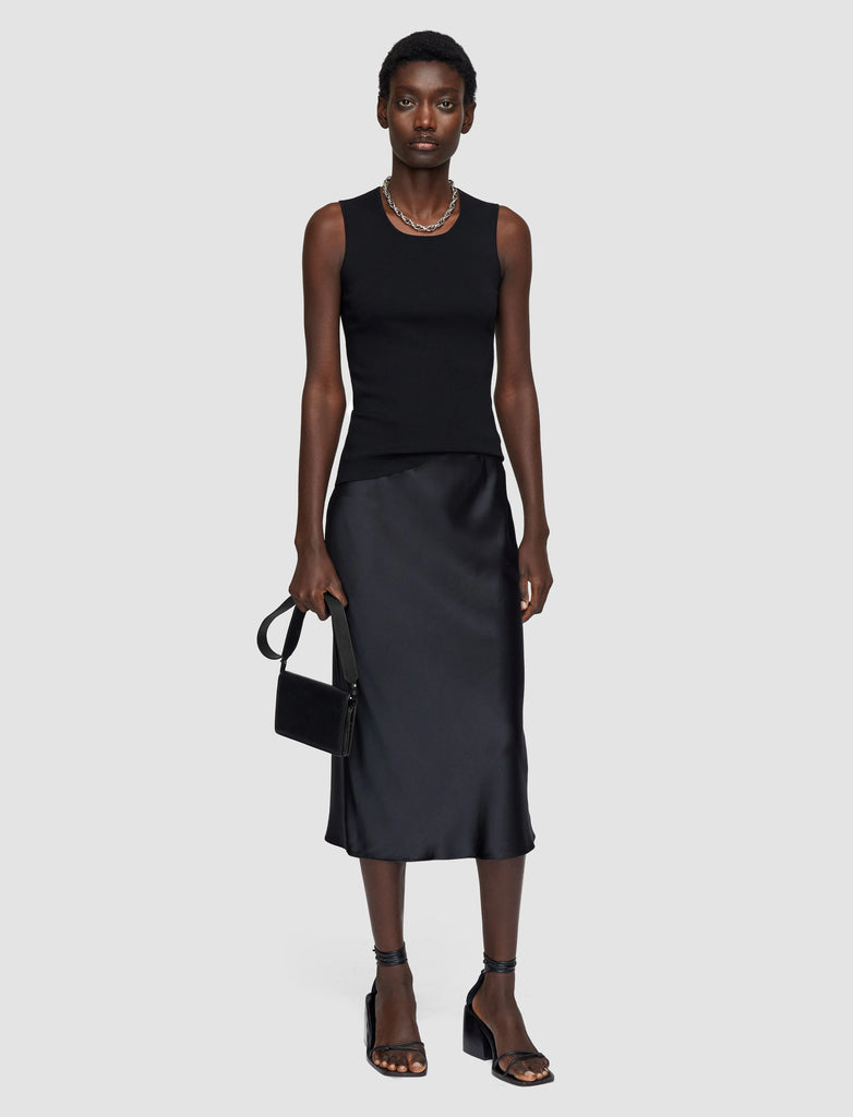 Part of Joseph's Foundation Collection the Isaak Silk Satin Skirt is a fabulous wardrobe basic - though it is anything but basic.&nbsp; Crafted from their signature super soft lustrous silk and featuring a mid rise, slim fit and a fluid finish this works perfectly with a silk blouse or a cozy knit!