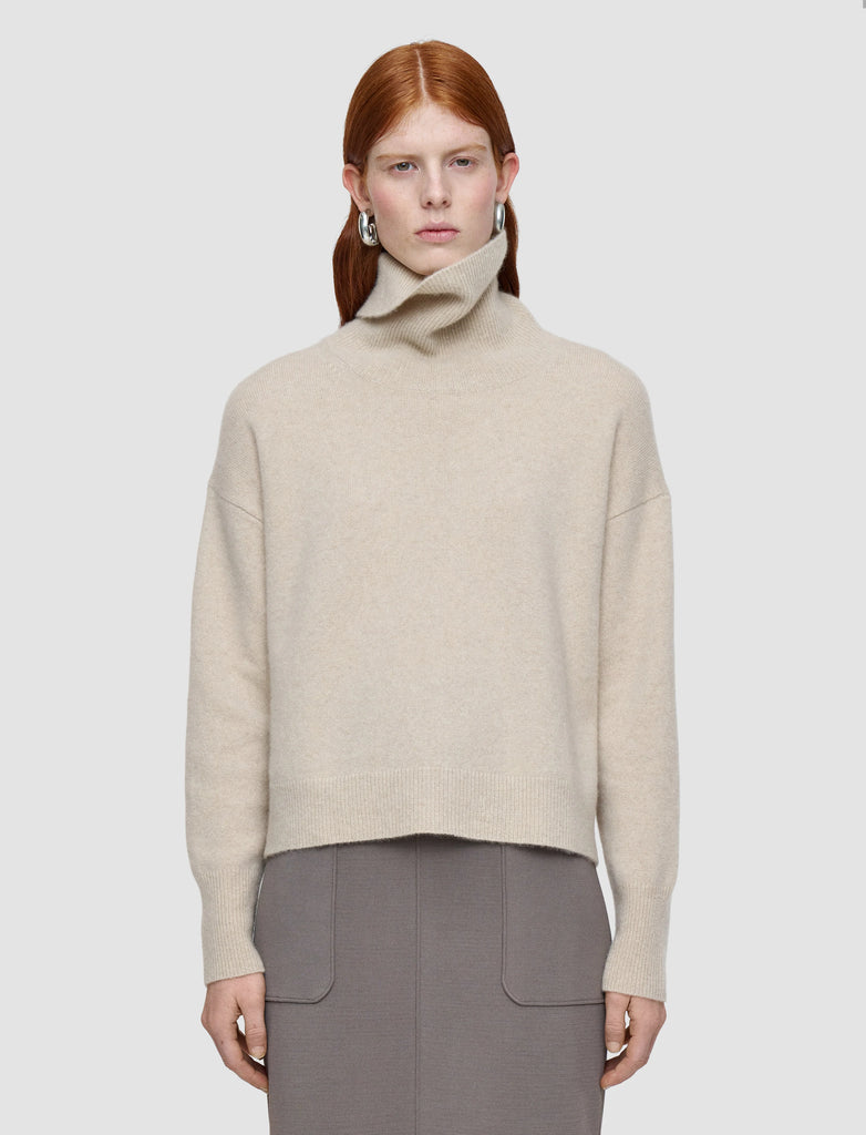 The Brushed Cashmere High Neck Jumper from uber luxe English brand Joseph features a relaxed shape and is crafted from the softest cashmere blend.&nbsp; With a brushed texture that gives an extremely luxurious hand feel and dropped shoulders, ribbing at the neckline, hem and cuff you will never want to take this off.