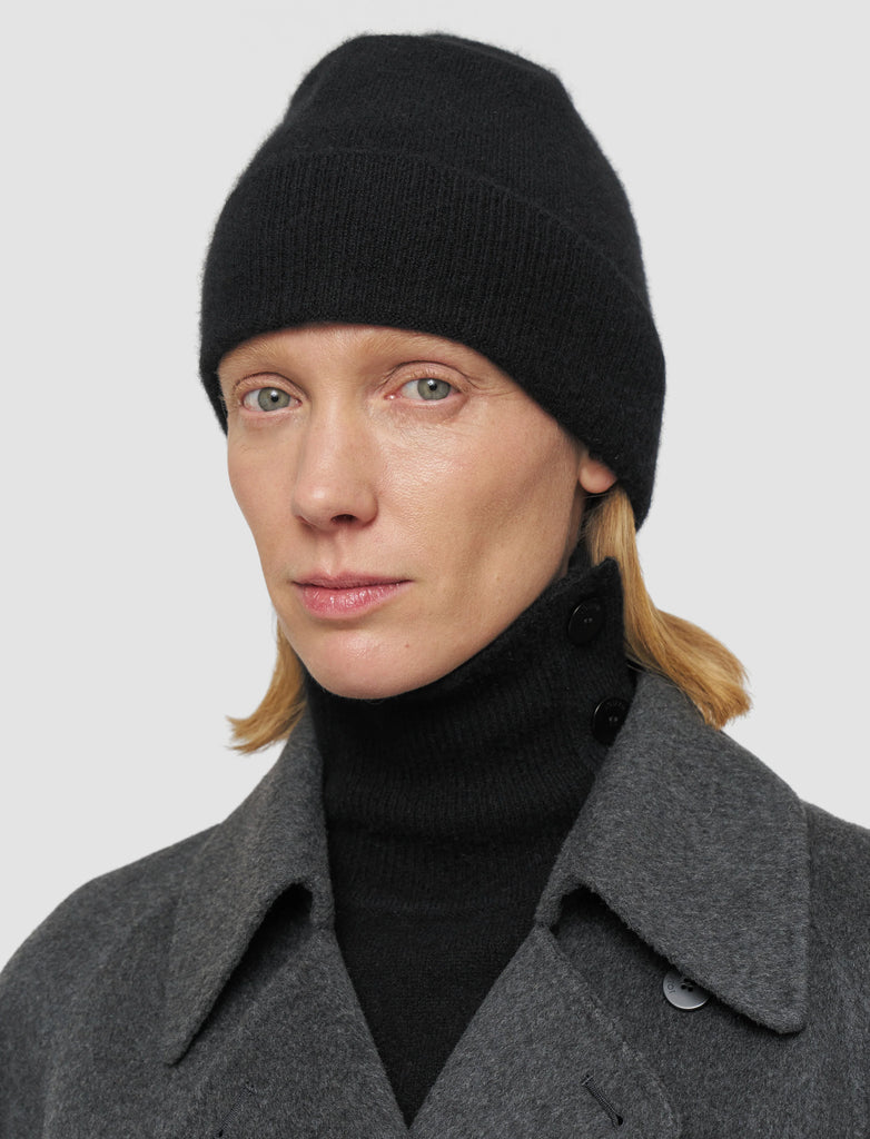 The perfect cashmere hat from one of our favourite luxury brands, Joseph.&nbsp; Crafted from a super soft cashmere blend in a classic minimal beanie style and featuring a stylish folded ribbed edge this feels as good as it looks. 