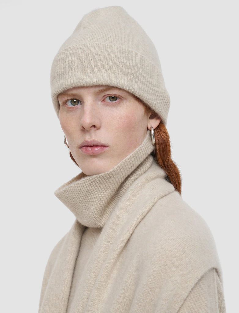 The perfect cashmere hat from one of our favourite luxury brands, Joseph.&nbsp; Crafted from a super soft cashmere blend in a classic minimal beanie style and featuring a stylish folded ribbed edge this feels as good as it looks.