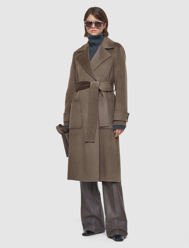 This gorgeous coat of dreams is a perfect example of what Joseph do best.&nbsp; Crafted from a super soft cashmere and wool blend and featuring a relaxed fit, an a line shape, double breasting, 2 shell buttons, front patch pockets and a self tie put this coat over anything and you immediately elevate your look and feel polished.&nbsp;