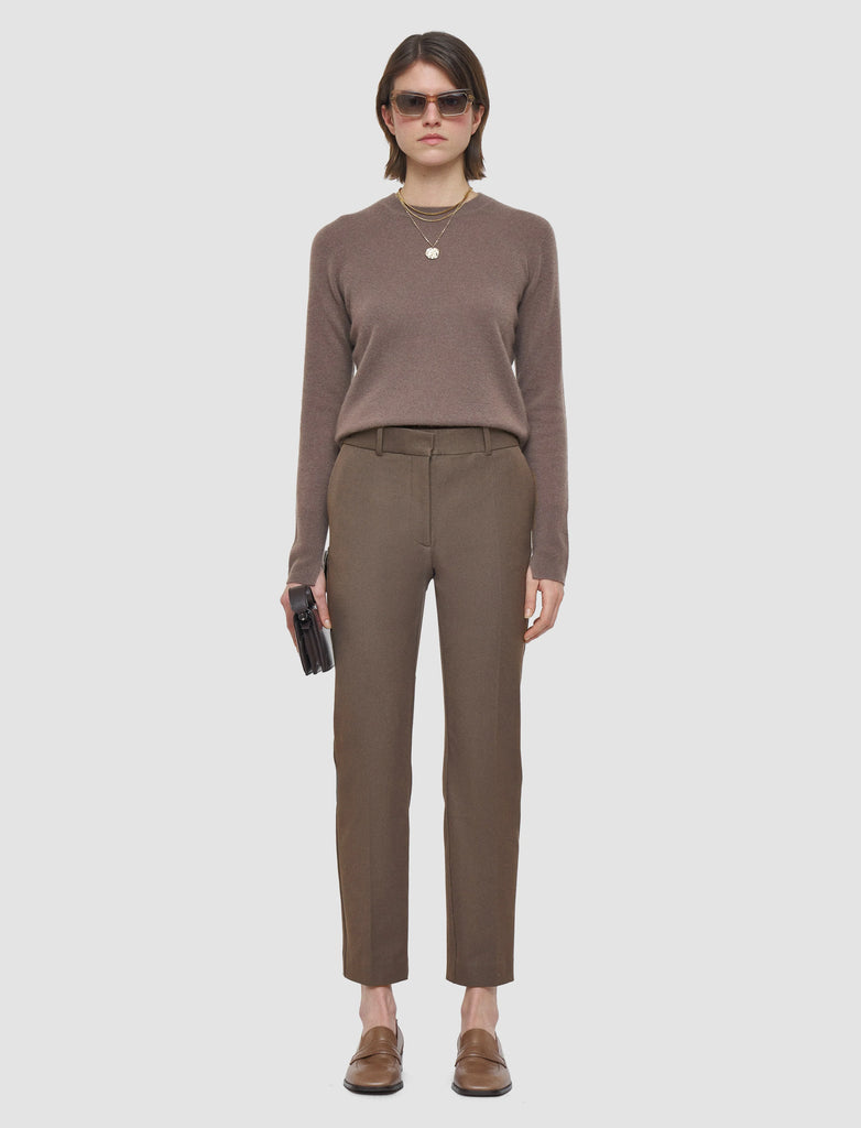 The Coleman Gabardine Trousers from Joseph are a mid-rise, regular fit tailored trouser crafted from Joseph's signature stretch fabric. Offering shape and comfort, these timeless trousers have a heavy weight feel and look fab paired with a silk blouse.&nbsp; We recommend sizing up as they run quite small.