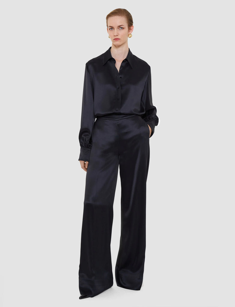 The Dijon Double Satin Trousers definitely deserve a spot in your silky trouser collection!&nbsp; Crafted from a responsibly sourced super soft fabric which in known for it's lustrous silk like texture and featuring a high rise, a wide leg, a flat front with elastic back waistband these give a clean finish and an extremely elegant silhouette.&nbsp; Great for the party season!