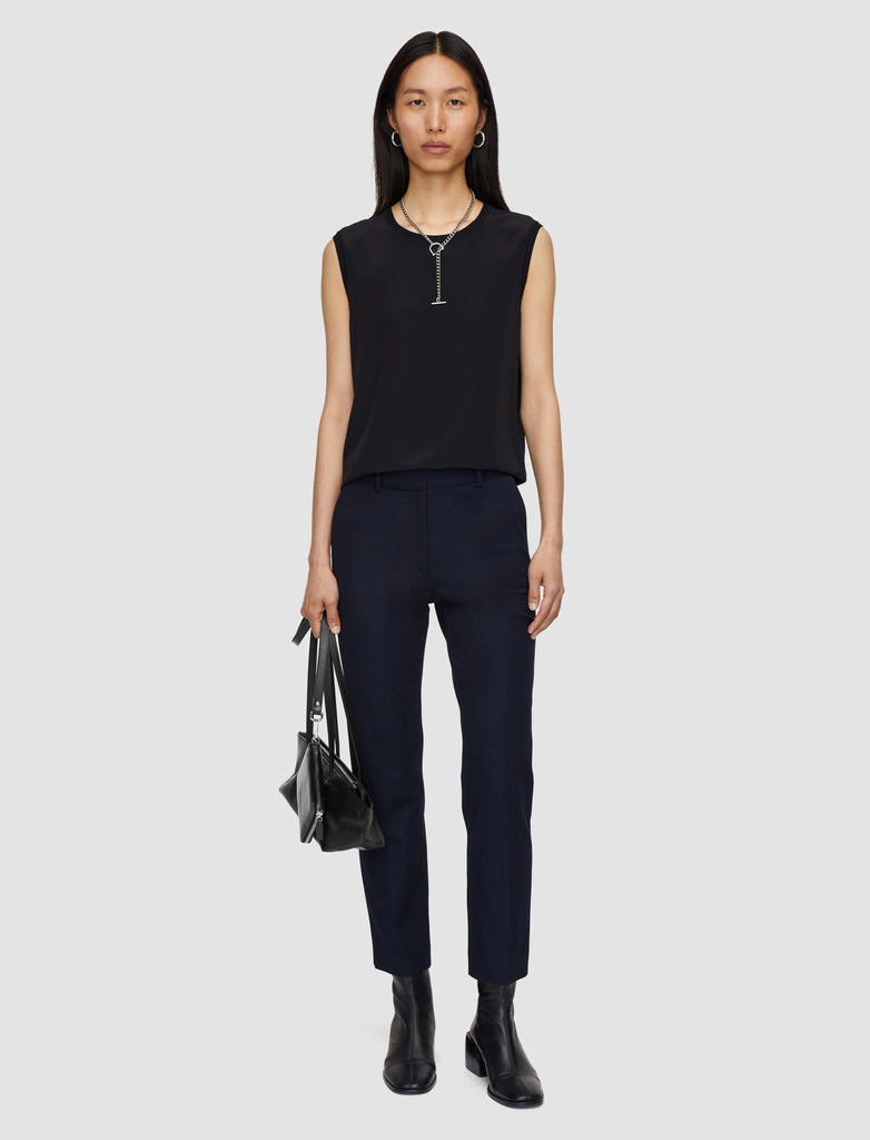 The Coleman Gabardine Trousers from Joseph are a mid-rise, regular fit tailored trouser crafted from Joseph's signature stretch fabric. Offering shape and comfort, these timeless trousers have a heavy weight feel and look fab paired with a silk blouse.&nbsp; We recommend sizing up as they run quite small.