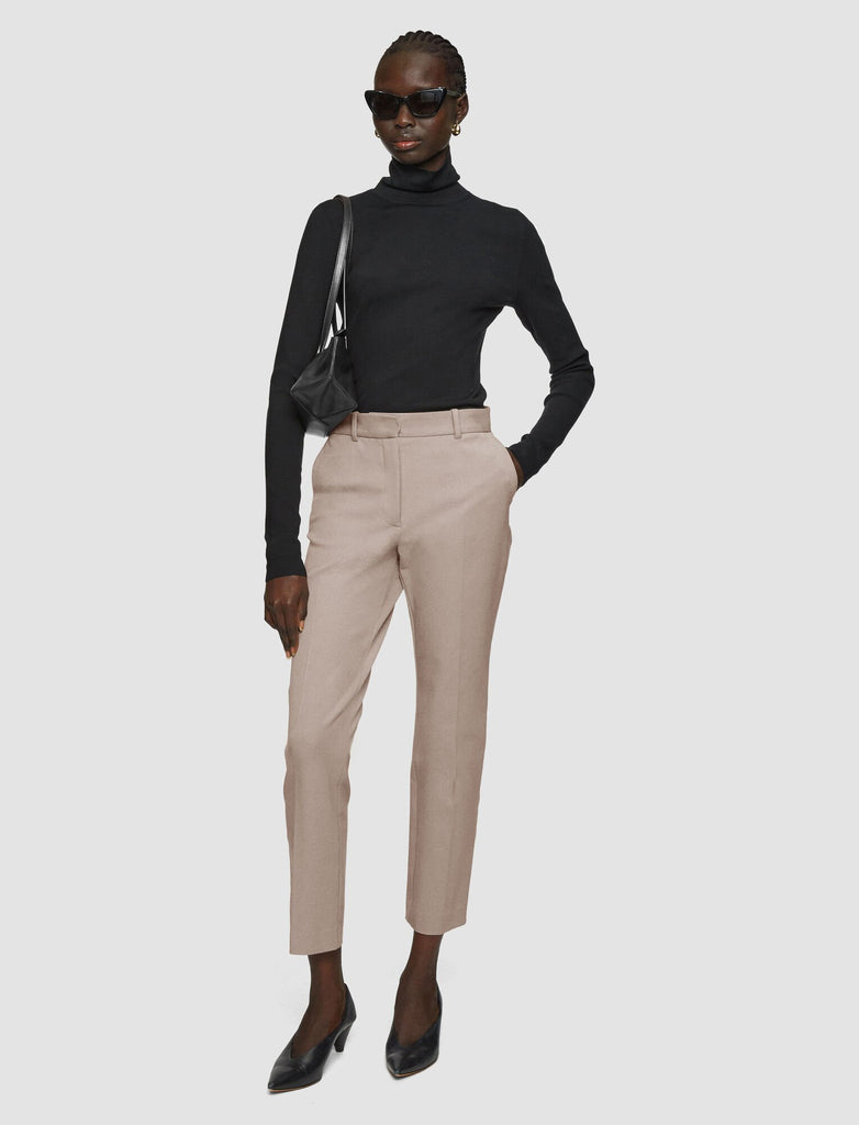 The Coleman Gabardine Trousers from Joseph are a mid-rise, regular fit tailored trouser crafted from Joseph's signature stretch fabric. Offering shape and comfort, these timeless trousers have a heavy weight feel and look fab paired with a silk blouse.&nbsp; We recommend sizing up as they run quite small.