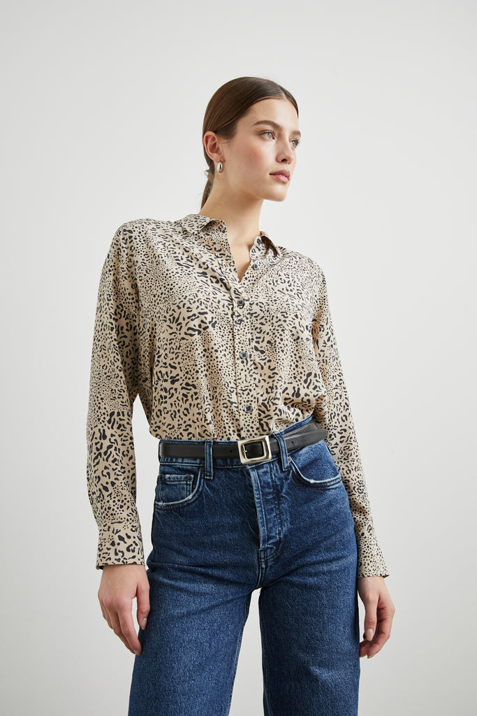 The Kate is a long sleeve button-down shirt from Rails made from 100% silk. This super-soft shirt comes with a single front pocket in a fun animal print. &nbsp;Looks great tucked in to your Paige jeans for a sophisticated yet casual look.