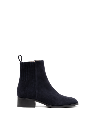 We've found the perfect walking boot in always wearable navy.&nbsp; With an easy to put on side zip and crafted from gorgeous kid suede these ankle boots are super comfortable and perfect for everyday wear.