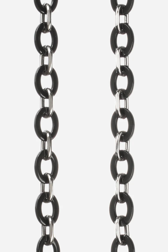 We are delighted to be stocking phone chains from La Coq Francaise. They are the essential accessory! No more searching for your phone at the bottom of your bag or on your desk as it will always be with you! Perfect for having your hands free while doing something else, the straps can be worn on the shoulder, across the body or in the hand.  Pair with the appropriate ring case for your iPhone model, or one of the universal adapters.The Cassy Metal chain is in black resin with metal links.