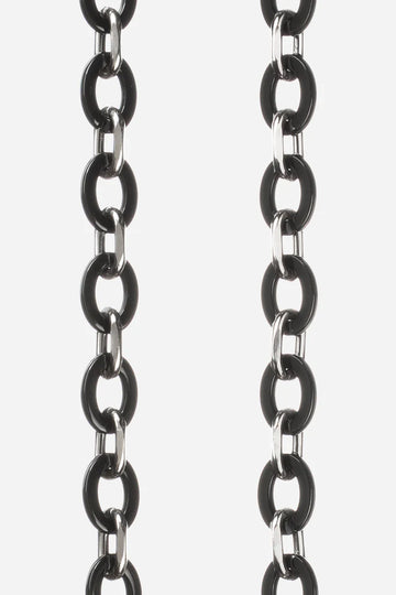 We are delighted to be stocking phone chains from La Coq Francaise. They are the essential accessory! No more searching for your phone at the bottom of your bag or on your desk as it will always be with you! Perfect for having your hands free while doing something else, the straps can be worn on the shoulder, across the body or in the hand.  Pair with the appropriate ring case for your iPhone model, or one of the universal adapters.The Cassy Metal chain is in black resin with metal links.
