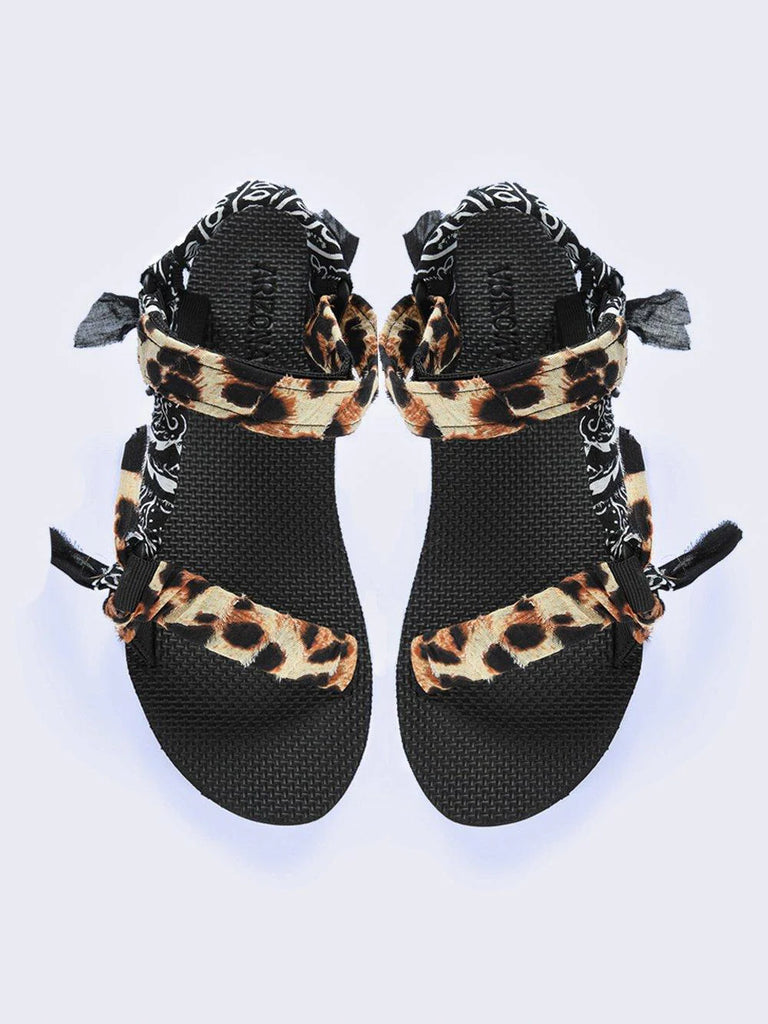 The Trekky sandal are known for their incredible comfort and their play on the “ugly shoe” look.  They are made with recycled vintage cotton bandanas in leopard, black and white and have adjustable velcro straps.  These are sure to add a fun and casual element to any outfit and will no doubt become a staple in your summer/ holiday wardrobe.  