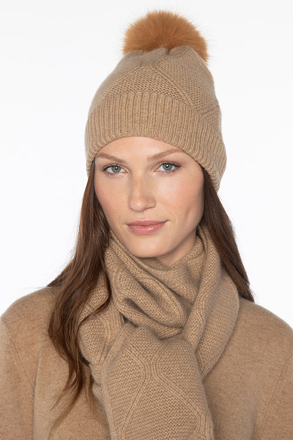 Gorgeous bobble hat from luxury cashmere brand Kinross Cashmere.&nbsp; Super soft as you would expect from fantastic quality 8 ply cashmere and in a great neutral colour this will keep you head toasty and keep you looking stylish this winter!