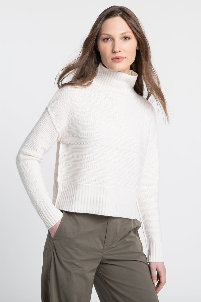 We love a winter white jumper!  And when it's 100% cashmere and super soft and features a cropped length, a loose turtleneck and drop shoulder we're a bit in love!  Pair with your high waisted denim or skirt for an easy weekend vibe!