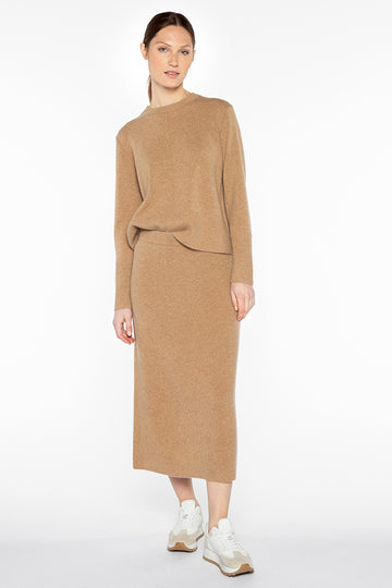 Gorgeous super soft thick cashmere ribbed skirt from luxury cashmere brand Kinross.&nbsp; In always wearable camel this skirt features an elasticated waist, is a midi length and falls to a straight hem.&nbsp; Pair with the matching camel jumper for a put together knit look!&nbsp; Can wear with trainers for a dressed down look or heeled boots for a more elevated evening.