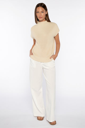 This cap sleeve cotton top from Kinross is hugely versatile and ever so pretty and soft.&nbsp; In a creamy parchment colour and featuring a mock turtleneck and cap sleeves this is perfect on it's own with your favourite white denim but you could also put a long sleeved tee under it for a bit of extra layering. 