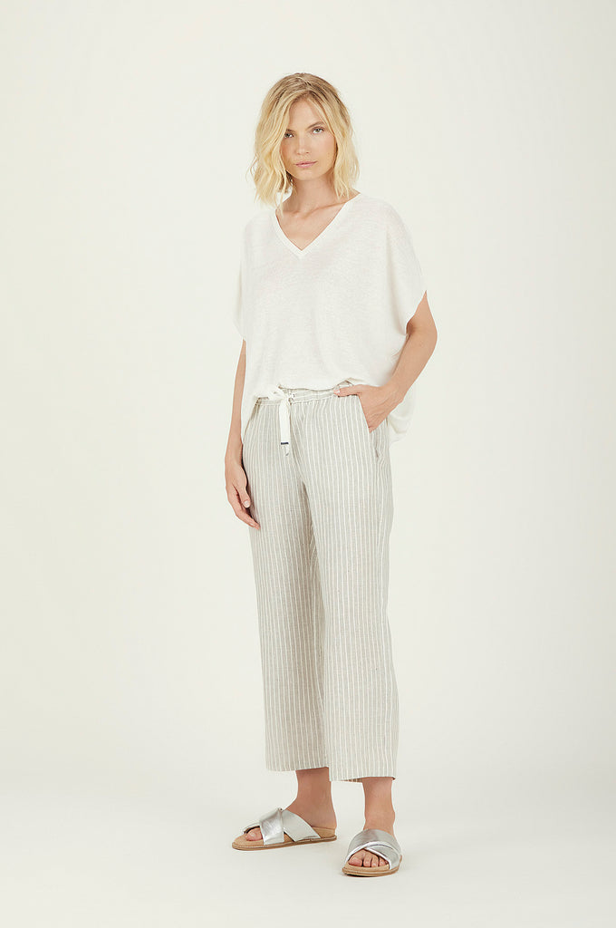 Super easy to wear pull on trousers from chic Italian brand Le Tricot Perugia.  Featuring a drawstring waist, striped pattern and ankle length these are perfect paired with a white tee or shirt and either trainers or pretty sandals.