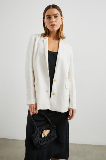 No wardrobe is complete without a white jacket and the lovely Lucienne from our favourite Californian brand Rails if just the ticket!&nbsp; &nbsp;With a slightly relaxed fit and featuring 2 centre buttons, side patch pockets and a longer length this is perfect over dresses or paired with trousers/jeans.&nbsp; Great for an added layer when the sun goes down - stylish and useful!!!