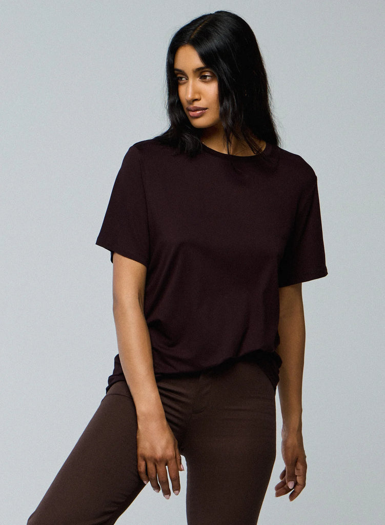 This T-Shirt from Majestic Filatures features a round neck and short sleeves and is crafted from 94% Viscose and 6% Elastane.  It is a relaxed fit and pairs perfectly with Majestic's wide leg trousers (available in store) or your favourite jeans.