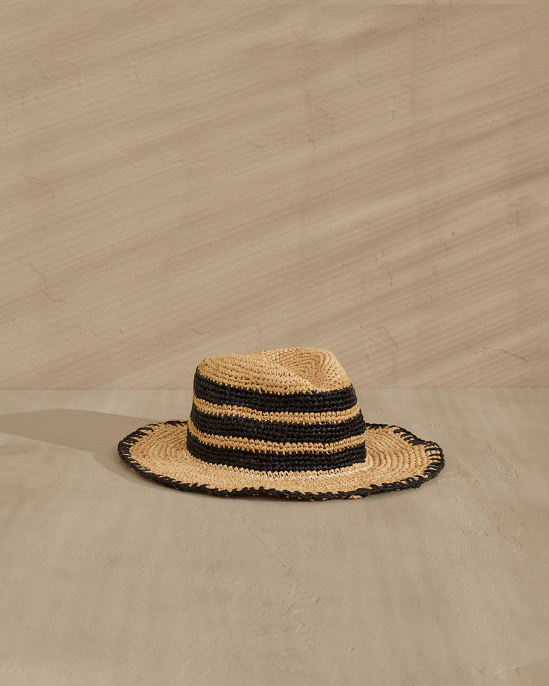 Manebi's Raffia Panama Hat is an essential piece in any holiday wardrobe!  With an adjustable internal cord this size will fit everyone.  Easy to fold up and pack in your suitcase and as we all know we need to shield our skin from the sun and this is the practical yet stylish way to do that.  