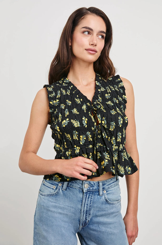 We love a pretty top and the Martine Top from Rails does not disappoint. With a flattering silhouette that works for day or evening, it is made from crisp cotton poplin and features a deep v neck, centre self ties, smocking throughout and pretty ruffle detailing at the neck, arms and hem.&nbsp; This blouse is perfect paired with your favourite denim!