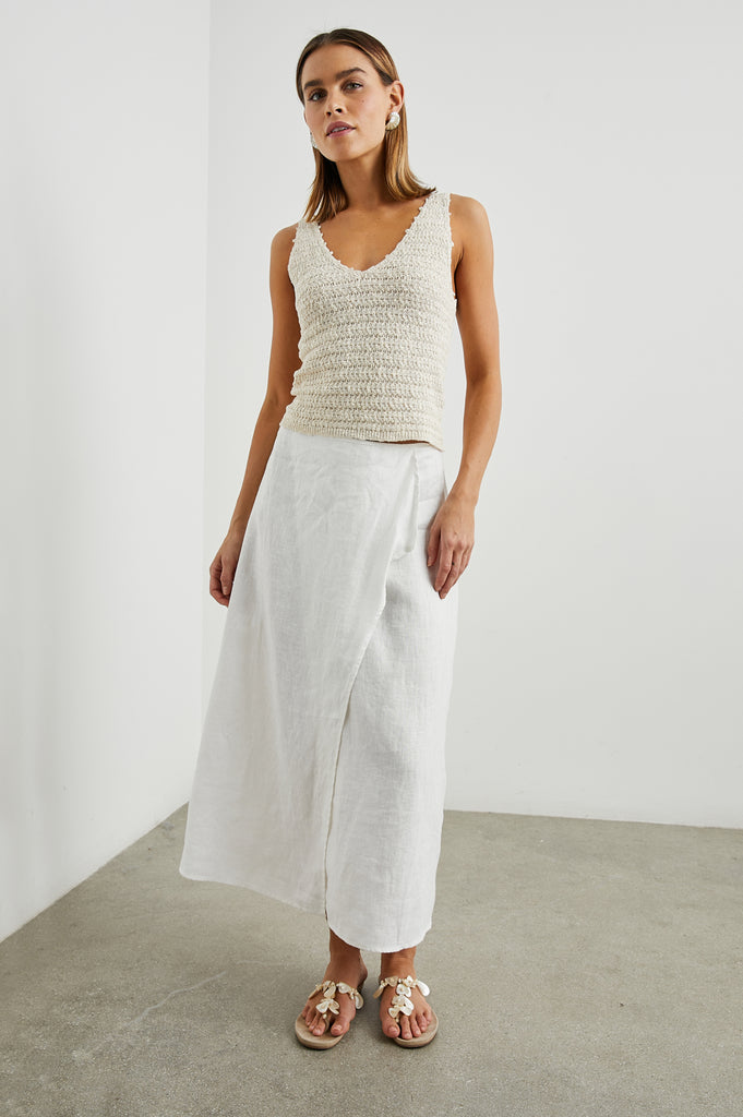 Flirty and fun this we love this gorgeous knit top from uber cool Californian brand Rails.&nbsp; Crafted from super soft cotton and in a great neutral colour this little crochet top pairs perfectly with the matching Sydney Skirt or your favourite denim shorts! You will wear this on repeat!