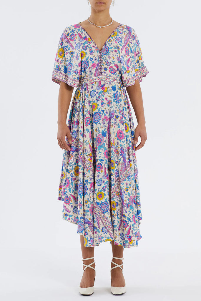 The Nightingale Dress from Lollys Laundry features a v-neckline at the front and back and a pretty string tie with tassels at the back.  It has short, loose fit sleeves and comes in a colourful, floral print making it the perfect addition to your summer wardrobe.  Pair it with your favourite espadrilles or ankle boots!