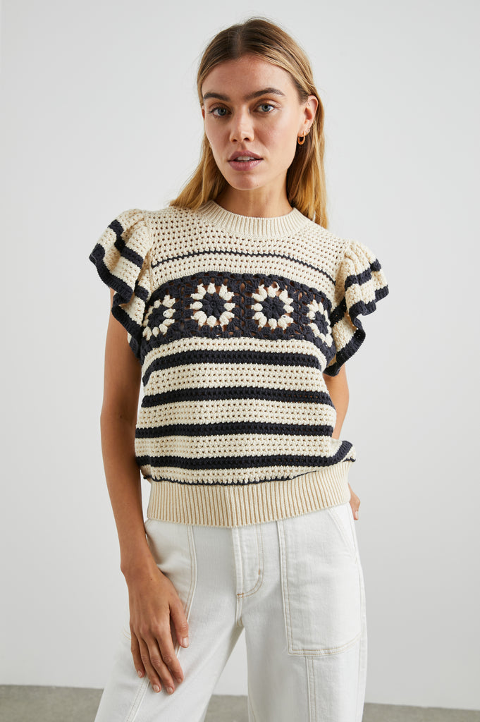 Trust me you will want a crochet top this season!  Penelope from Rails is a perfect choice.  In lovely cream and black and featuring a crew neck, ruffle detail at the sleeve and on trend striping this is perfect paired with your favourite denim jeans or skirts.