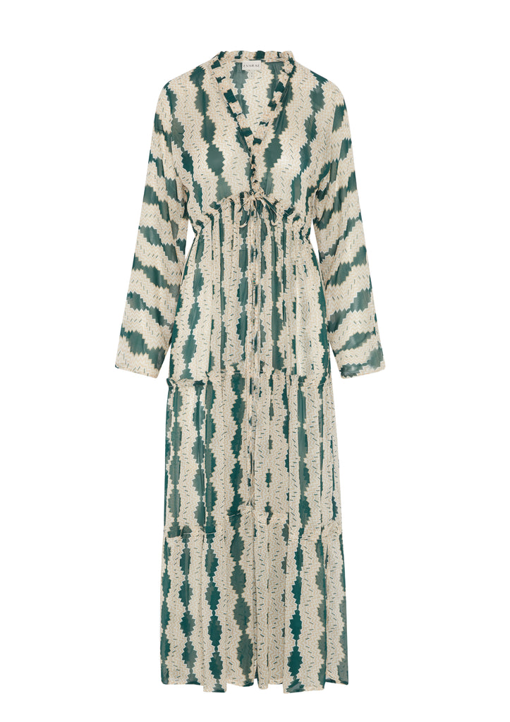 The Talia Dress from EVARAE features an adjustable front tie detail, a plunging neckline and long fluted sleeves with frilled cuffs. Wear this effortless jade coloured dress when going from the beach to dinner.
