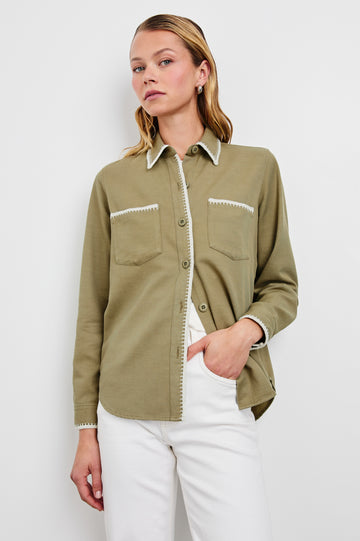 This super soft shirt or overshirt from Rails is a great transitional piece for Winter into Spring.&nbsp; In a pretty pale olive and featuring centre buttoning, 2 chest pockets and blanket stitch detailing this looks fab over a white tee with your white denim or can be worn on it's own.