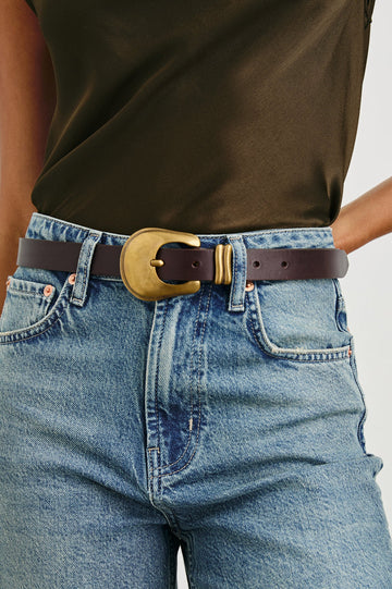 It's not just a belt - it's a Rails belt! Crafted from 100% Italian leather the brown version features extra loops for an adjustable hip to waist fit and a nice chunky buckle. Perfect with denim or wrapped around the waist of your favourite dress this is a classic that will never go out of style. 