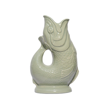 These stunning handmade "Gluggle Jugs" make the perfect gift or addition to your home. They are a perfect centrepiece for your table and, as well as being used to serve water, they can also be used as a quirky vase, a utensil holder or as a decorative piece. Manufactured in England since the 1870's they are iconic because they make a delightful "gluggle" sound when poured! The only question is, which colour to buy?!