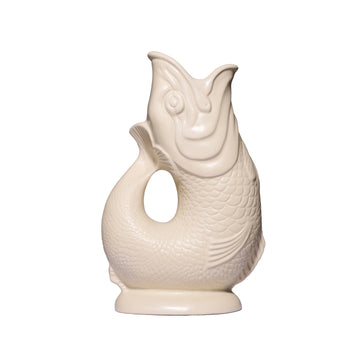 These stunning handmade "Gluggle Jugs" make the perfect gift or addition to your home. They are a perfect centrepiece for your table and, as well as being used to serve water, they can also be used as a quirky vase, a utensil holder or as a decorative piece.  Manufactured in England since the 1870's they are iconic because they make a delightful "gluggle" sound when poured! The only question is, which colour to buy?!