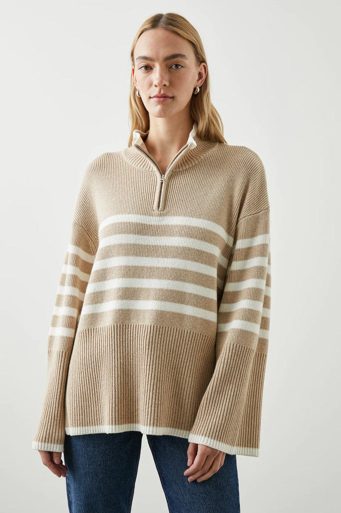 The Tessa Sweatshirt from Rails makes the perfect everyday transitional piece. Made from a cozy wool blend, this sweater features a quarter front zip, dropped shoulders and it has a relaxed fit. Wear with jeans and trainers for an easy weekend look.