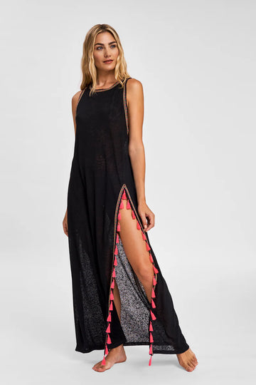 The Tassel Slit Dress from Pitusa is made from their sheer burnout fabric. It features a round neckline and a side split with tassel detailing.  It is the perfect holiday cover-up and will take you from the beach to the bar with confidence!