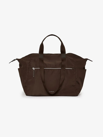 Packing will no longer be a chore with this rich chocolate brown weekender from Varley.  Made in a lightweight nylon with a zip up internal and external pocket, removable strap and water bottle holder, all your essentials will fit neatly within.  Packing down to next to nothing, it is perfect for days out or the extra bag you may need.