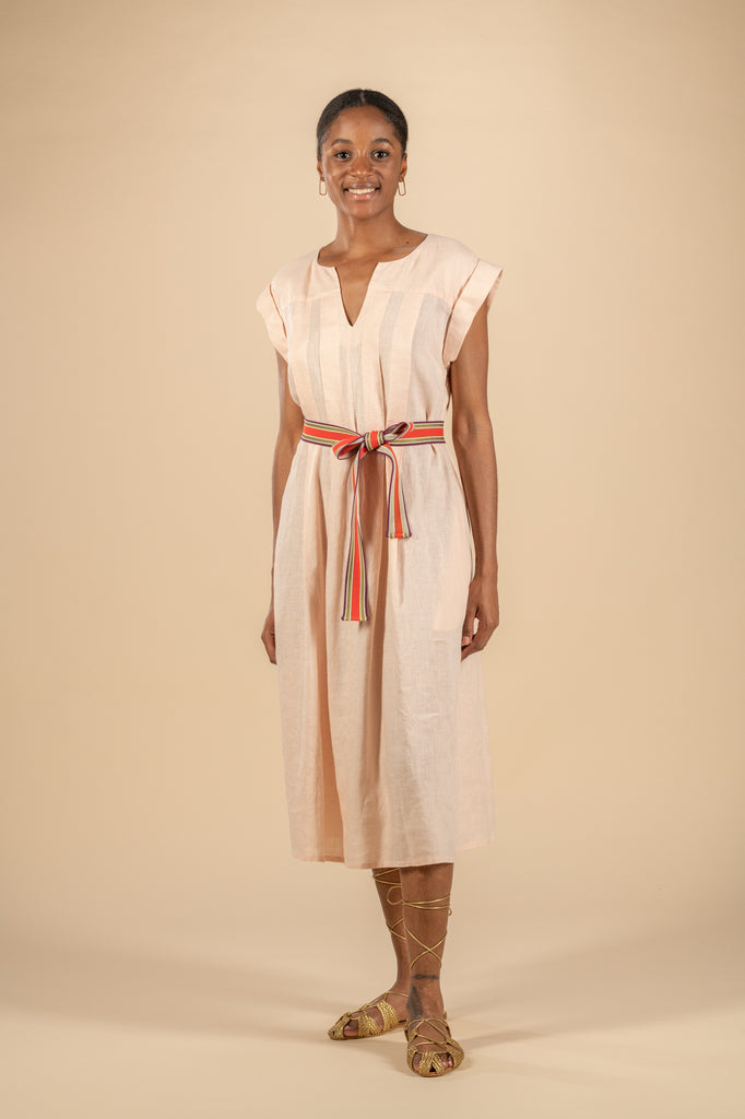This easy linen Sofia dress from Zyga is in a pretty subtle pink and features cuffed cap sleeves, pockets and faux pleat detailing at the bust. This dress is just as elegant belted as it is kept loose fitting. Wear with strappy sandals for a light and airy summer look.