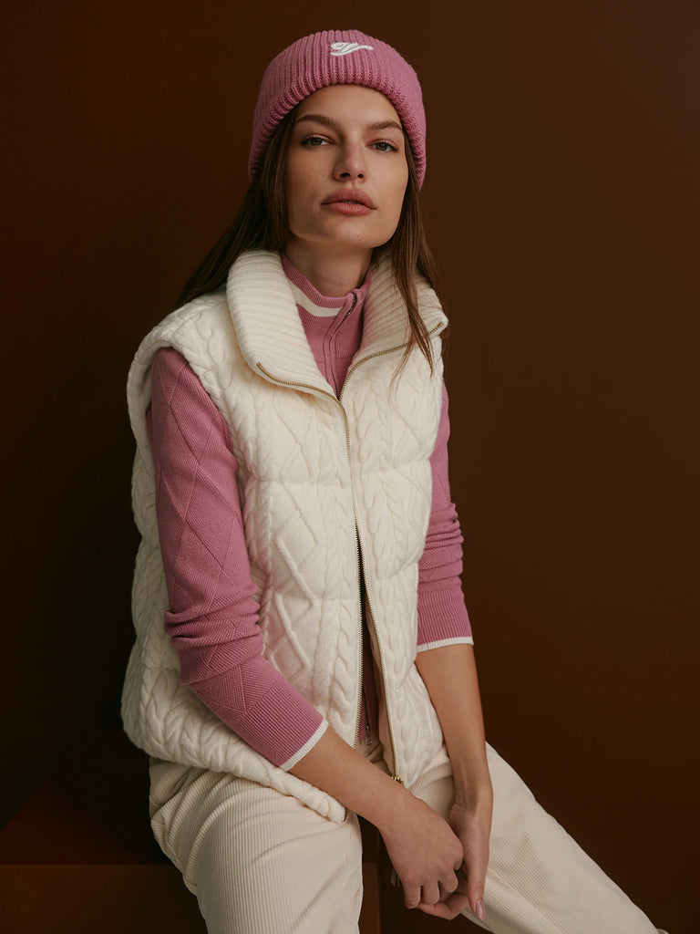 Add an extra layer of style to your autumn/winter look with Varley's Irina gilet. It's padded with a DuPont Sorona® fill to keep you warm and features classic cable stitching in a plush knit, a chunky rib knitted collar, pockets, and a practical double-ended zip.