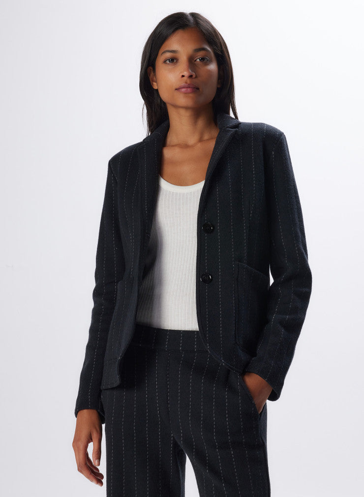 Majestic have done it again with this contemporay classic! A single breasted, pinstipe black and grey wool mix jacket.  Llined in a jersey fabric and with 2 front pockets and 2 buttons it will see you from work meetings through to drinks with the girls.  This is a wardrobe must and once you've popped it on, you wont want to take it off!! 