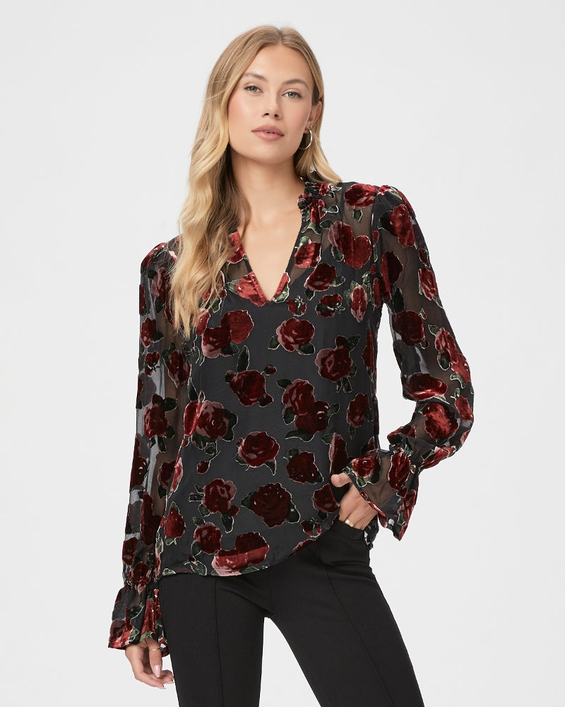 We love a Paige blouse and this one is just as lovely as we've come to expect!  Crafted from silk and velvet with a beautiful red floral motif, a flattering v neck, elasticated cuffs and a relaxed shape this looks perfect paired with Paige Cindy Black Luxe for an elevated evening look!  A grown up proper going out blouse!