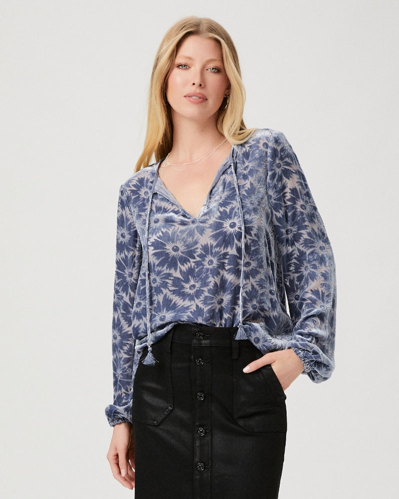 We're loving the Selmah Blouse in Iced Slate from Paige.  This long sleeved silk blouse featured a unique floral velvet burnout design and has neck ties and elasticated cuffs - this is effortless dressing at it's finest.  Pair with your favourite denim for a day look or a pretty skirt and heels for evening.