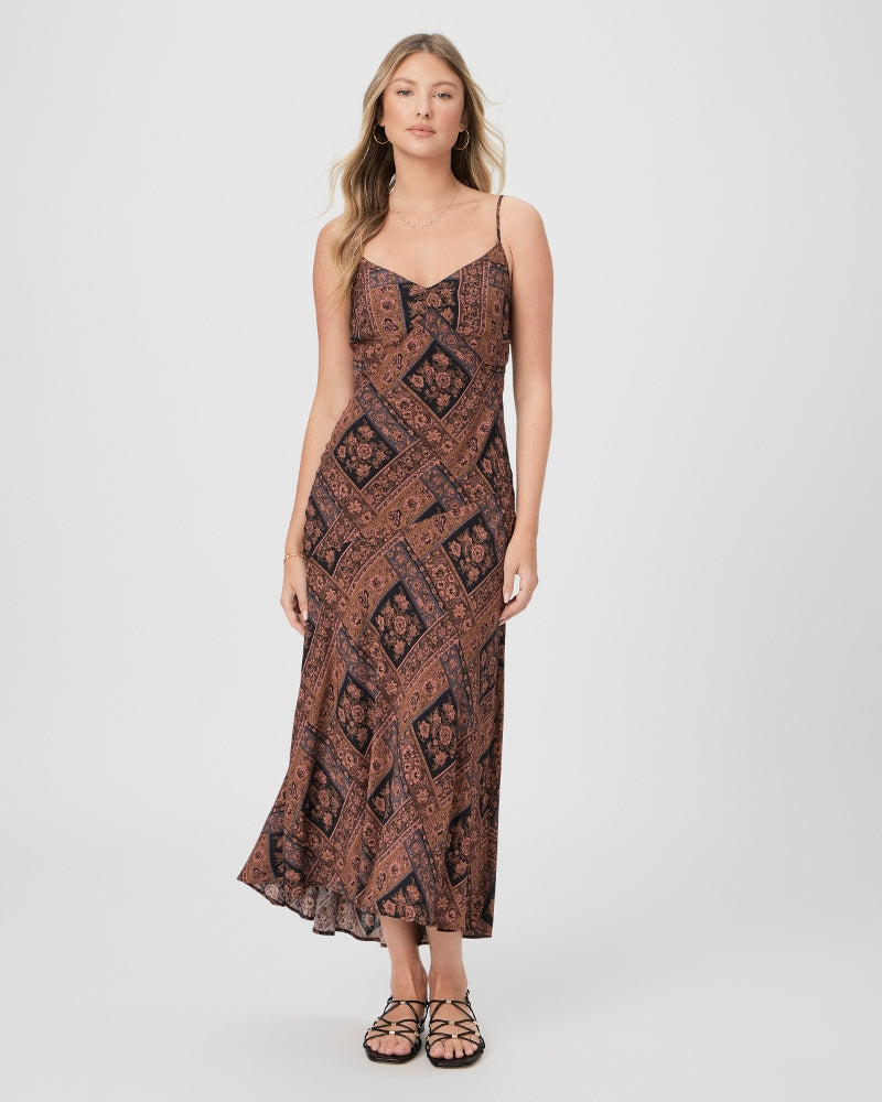 We love an easy to wear slip dress and this midi from Paige does not disappoint!&nbsp; Crafted from their signature super soft and lightweight viscose fabrication Viejo features a flattering v neckline, bust seams and is cut on the bias .&nbsp; In a pretty black, brown and pink provincial scarf print this dress is perfect for any warm weather outing.