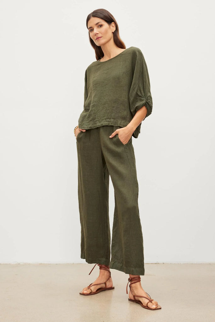 Velvet by Graham &amp; Spencer's fabulous Lola trousers are back this season in this fab green tone. Crafted from woven linen these easy to wear pull on trousers feature a relaxed leg and a very slight ankle crop making them the perfect choice for a summer day.