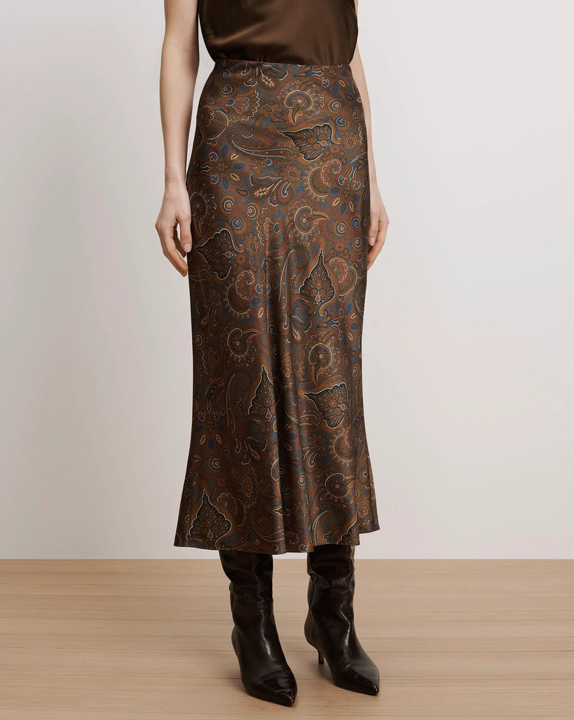 Crafted from Veronica Beard's premium stretch silk, the Clover Skirt in a very on trend chocolate print is a stand out piece!&nbsp; The Clover skirt falls to mid calf and drapes in a beautiful fashion - this is one you'll reach for again and again.&nbsp; Excellent for dressing up or down - silk blouse with heels or a cozy cashmere knit with boots or trainers this will take you from coffee to cocktails effortlessly.&nbsp;&nbsp;