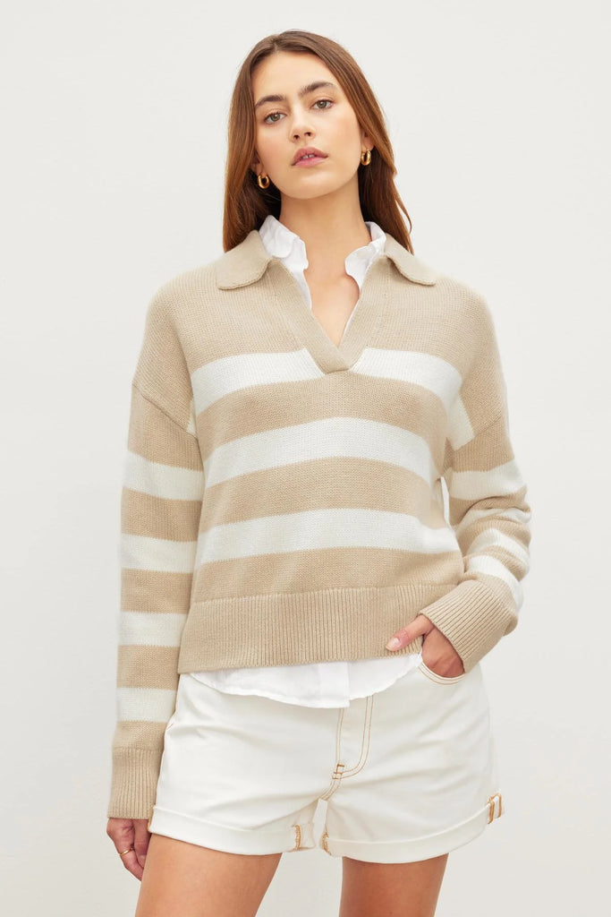 The Lucie Jumper is a super soft cotton cashmere knit from Velvet by Graham & Spencer. In a neutral stripe this pullover features a preppy/sporty collar and long sleeves. This is perfect paired with your favourite skirt or denim!