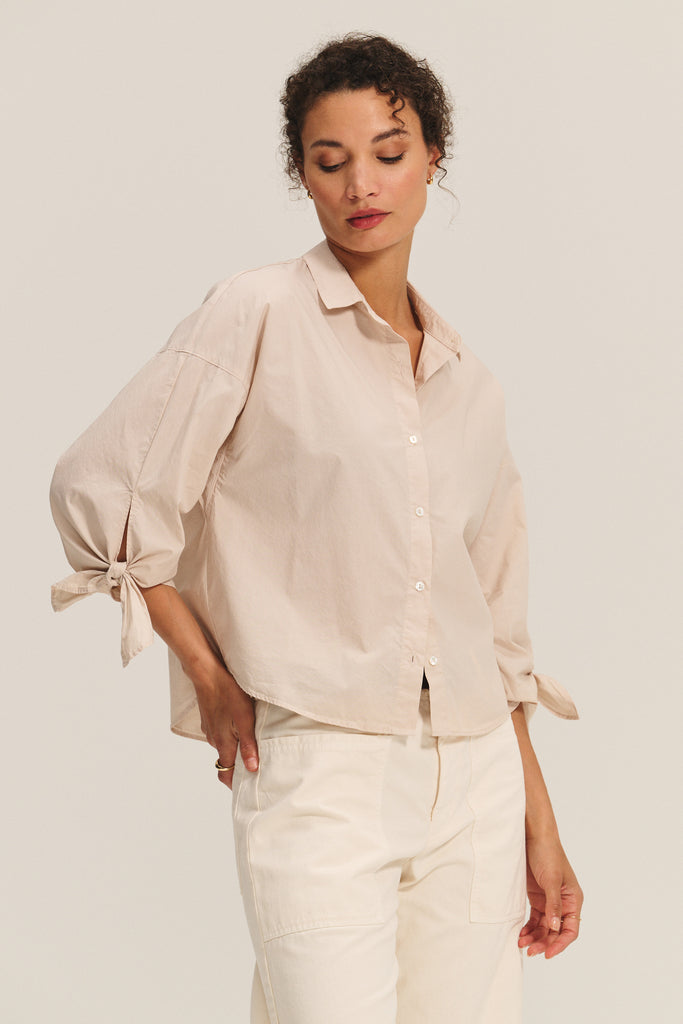 The perfect shirt.&nbsp; The Arlette Shirt from Velvet by Graham &amp; Spencer is crafted from super soft 100% cotton poplin and features a dropped shoulder, a relaxed fit and a feminine tie detail at the 3/4 length sleeve cuff.&nbsp; &nbsp;Also available in store in white and chill.