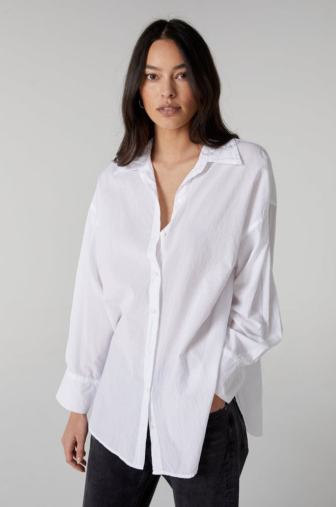 The perfect oversized white shirt.&nbsp; The Redondo Shirt from Velvet by Graham &amp; Spencer is crafted from super soft 100% cotton and features a dropped shoulder and a very relaxed fit.&nbsp; Surprisingly feminine for a shirt that looks like you may have stolen it from your partner!&nbsp; Also available in store in an ecru colour.