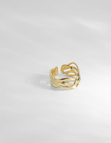 The Nami Ring is a unique and special piece. Louise Damas has placed each golden wave meticulously to create the impression of perfect harmony and infinite movement.The ring is handcrafted in her Parisian workshop from recycled brass which has been gilded with 24k recycled RJC certified fine gold. 