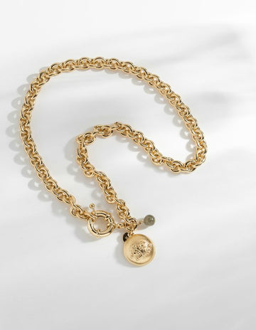 Strong yet delicate - these are words that could describe a woman or this lovely necklace from Louise Damas.  Featuring a small Labradorite bead which is known for it's protective virtues this is a necklace you won't want to take off.  