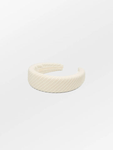 Adding a touch of elegance to any wardrobe the birch white cord hairbrace will complete your everyday and festive occasion outfit. Width is 4 cm.
