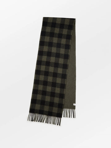 The Florenca scarf by Becksonderguaard will be a perfect addition to your autumn/winter wardrobe   It is made from 100% recycled wool, with checks on one side and plain on the other.  It measures 37 x 220 cm.   Also available in Melange Brown.